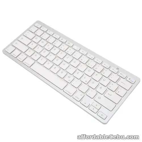 1st picture of (German) Mini Keyboard Wireless Keyboard 78 Keys Ultra Thin Portable For Sale in Cebu, Philippines