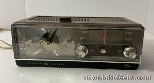 1st picture of Vintage General Electric 1960s Clock Radio Woodgrain C2500B / C2504B AS IS/PARTS For Sale in Cebu, Philippines