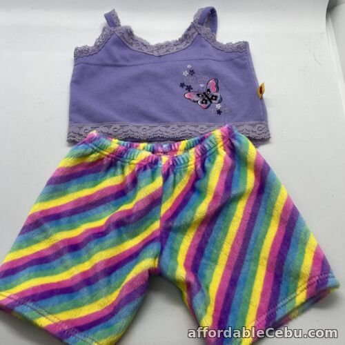 1st picture of Build A Bear Purple Pj Top With A Butterfly And Cosy Fluffy Rainbow Pj Pants For Sale in Cebu, Philippines