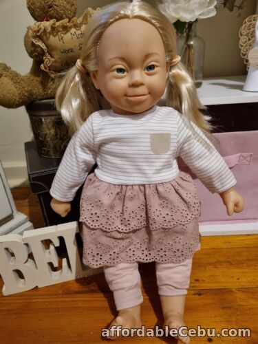 1st picture of Amelia Down Syndrome Girl Doll Blonde Hair Blue Eyes Pigtails Soft Body For Sale in Cebu, Philippines