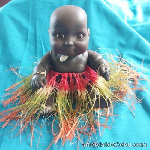 1st picture of Dark Skin Islander Baby Doll In Hula Skirt Good Condition For Sale in Cebu, Philippines