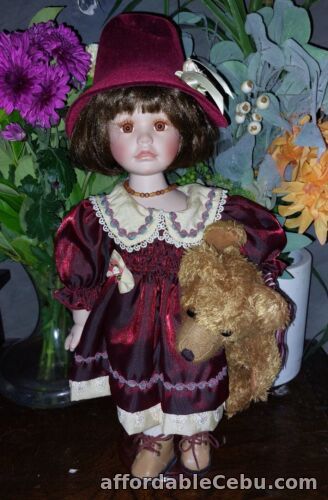 1st picture of Porcelain Vintage Doll Bear Glass Eyes Victorian Dress Leather Shoes Original For Sale in Cebu, Philippines