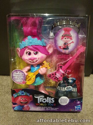 1st picture of Trolls World Tour DreamWorks - Pop-to-Rock Poppy Singing Doll with 2 Different L For Sale in Cebu, Philippines