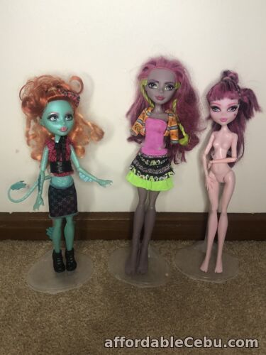 1st picture of Monster High Lorna Mcnessie, Marisol Coxi & Draculaura Monster Exchange Dolls For Sale in Cebu, Philippines