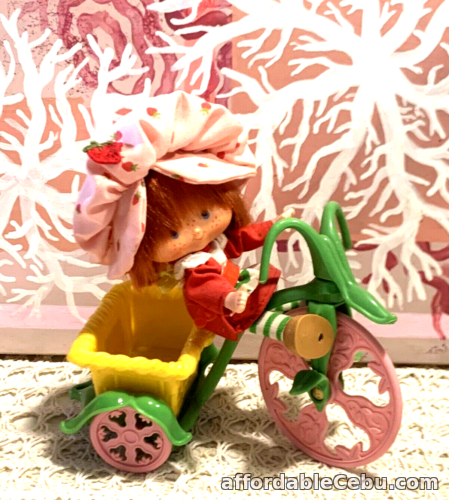1st picture of VINTAGE 1980s STRAWBERRY SHORTCAKE 1ST EDITION DOLL AND BERRY CYCLE BIKE For Sale in Cebu, Philippines