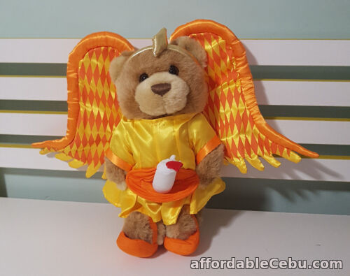 1st picture of RACQ CAREFLIGHT BEAR ANGEL ORANGE AND YELLOW PLUSH TOY SOFT TOY ABOUT 33CM ! For Sale in Cebu, Philippines