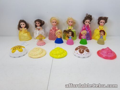 1st picture of Cup Cake Surprise Dolls 6 Large & 5 Small 1 Brush For Sale in Cebu, Philippines
