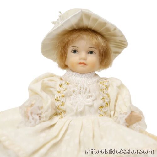 1st picture of Small porcelain doll off white dress outfit vintage For Sale in Cebu, Philippines