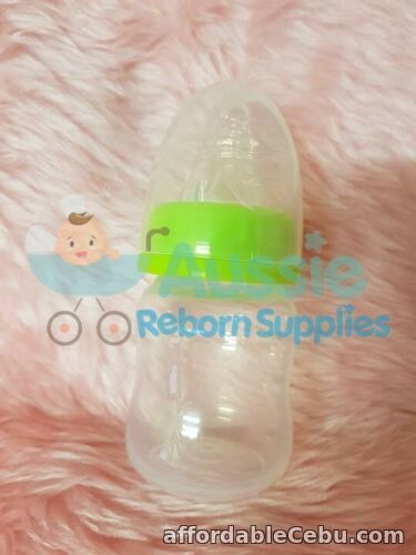 1st picture of Reborn Baby Unisex Lime Green Bottle Prop 60ml with NO FLOW baby Teat For Sale in Cebu, Philippines