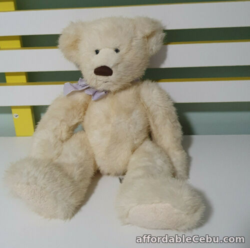 1st picture of RUSS TEDDY BEAR CREAM WITH PURPLE BOW 30CM NO NAME For Sale in Cebu, Philippines