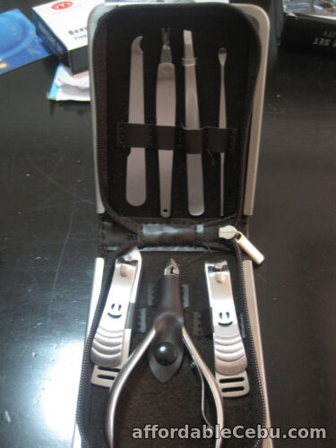 1st picture of BNIB Polished, Stainless Steel 7 in1 Manicure Set. High Quality, leather For Sale in Cebu, Philippines