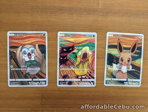 1st picture of Pokemon Card Munch The Scream Eevee Psyduck Rowlet Set of 3 For Sale in Cebu, Philippines