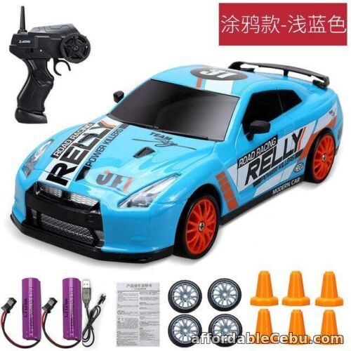 1st picture of Kids Small 2.4G Drift Racing Sports Car Metal Remote Control Toys For Children's For Sale in Cebu, Philippines