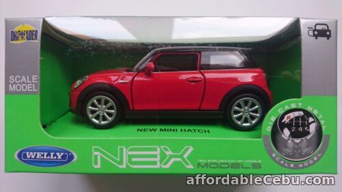1st picture of WELLY MINI COOPER NEW MINI HATCH RED 1:34 DIE CAST METAL MODEL NEW IN BOX For Sale in Cebu, Philippines