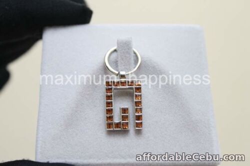 1st picture of GUCCI 18K WHITE GOLD AND CITRINE G LOGO PENDANT / CHARM - RARE - AUTHENTIC For Sale in Cebu, Philippines