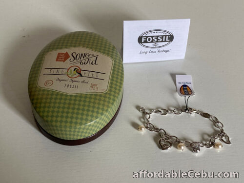 1st picture of NEW! FOSSIL JEWELRY STERLING SILVER BRACELET W/ CHARMS SET SALE For Sale in Cebu, Philippines
