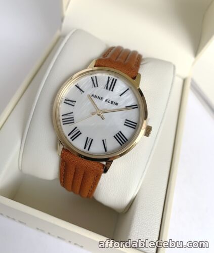 1st picture of Anne Klein Watch * 3678MPHY MOP Roman Numeral Dial Brown Leather Strap For Sale in Cebu, Philippines
