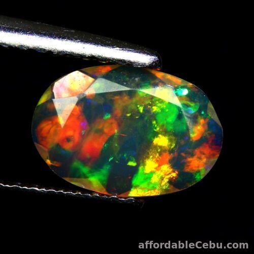 1st picture of 0.71 Carat NATURAL Multicolor Fire OPAL Ethiopia Oval Loose 9.1x6.2x2.7 Unheated For Sale in Cebu, Philippines