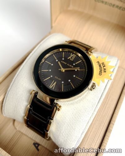 1st picture of Anne Klein Watch * 3844BKGB Solar Power Black Ceramic Gold Steel Watch for Women For Sale in Cebu, Philippines