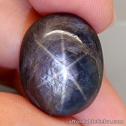 1st picture of 14.34 Carats Natural Star SAPPHIRE 6 Rays Bluish Brown 14.5x12.5x7.4mm Oval Cab For Sale in Cebu, Philippines