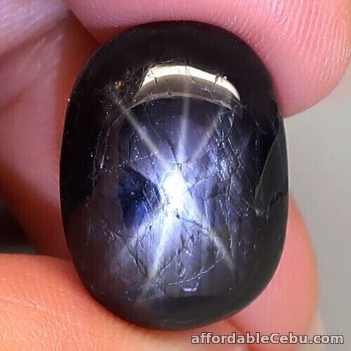 1st picture of 15.12 Carats NATURAL Black Star SAPPHIRE 6 Rays Loose Oval Cabochon 16.8x12x6.6 For Sale in Cebu, Philippines