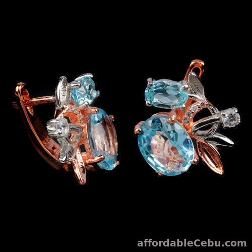 1st picture of Natural Sky Blue TOPAZ & White CZ 2-TONE 925 SILVER EARRINGS For Sale in Cebu, Philippines