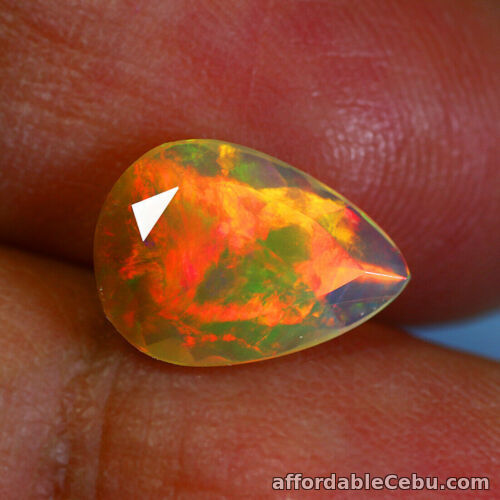 1st picture of 1.11 Carats Natural OPAL Rainbow Fire Pear 11.23x7.69x2.94mm Ethiopia For Sale in Cebu, Philippines