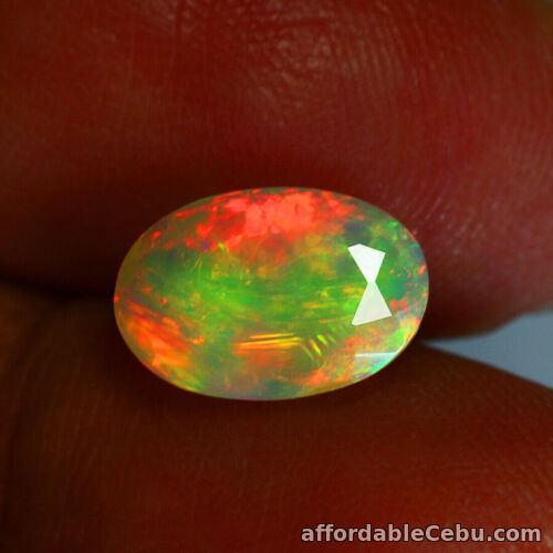 1st picture of 1.23 Carats NATURAL OPAL Fire Multi Flash Color 10.06x6.86x4.24mm Loose Ethiopia For Sale in Cebu, Philippines