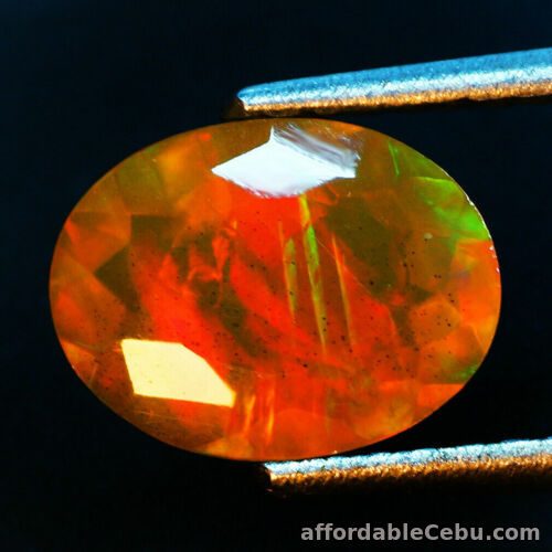 1st picture of FIRE 1.75 Carats Natural 10.8x8.38 Rainbow OPAL Multi Flashing for Setting OVAL For Sale in Cebu, Philippines