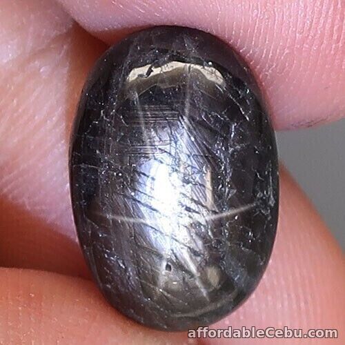 1st picture of 10.90 Carats NATURAL Black Star SAPPHIRE 6 Rays Loose Oval 15.2x9.8x6.8 UNHEATED For Sale in Cebu, Philippines