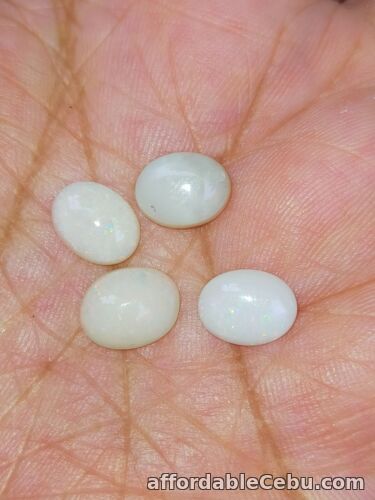 1st picture of 4.74 Carats 4pcs Lot 9.1x7.2x3.4mm NATURAL OPAL Multi-Color Rainbow Oval For Sale in Cebu, Philippines