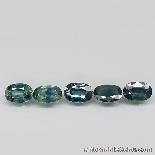 1st picture of 2.65 Carats Natural SAPPHIRE 5pcs Lot 6x4mm Greenish Blue Loose Oval Africa For Sale in Cebu, Philippines