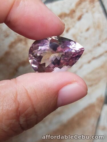 1st picture of 18.0 Carats NATURAL AMETRINE Unheated Bicolor Purple Yellow  Pear Loose 21x15mm For Sale in Cebu, Philippines