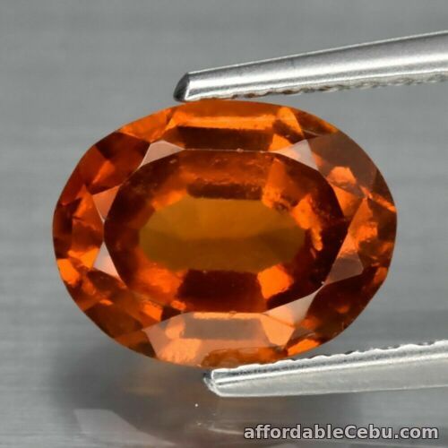 1st picture of 1.73 Carats Oval NATURAL Hessonite GARNET Sri Lanka 8.25x6.44 with CERTIFICATE For Sale in Cebu, Philippines