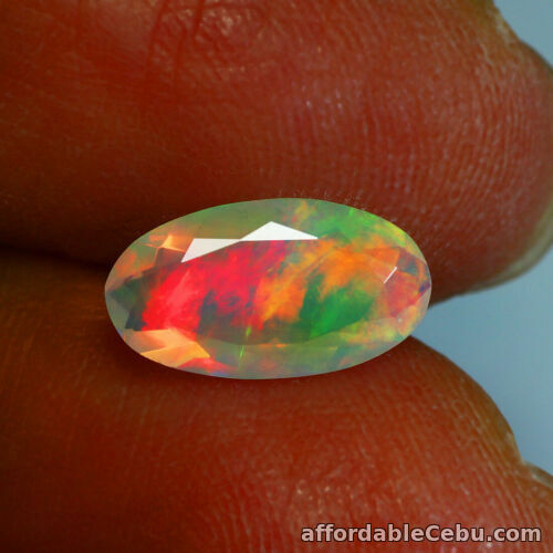 1st picture of 1.06 Carat NATURAL Multi-Color OPAL for Setting Oval Facet 11.22x6.18mm Unheated For Sale in Cebu, Philippines