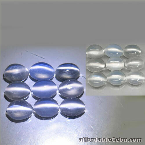1st picture of 13.08 Carats 8x6mm 9pcs Lot NATURAL White MOONSTONE Cat's Eye India Oval Cab For Sale in Cebu, Philippines
