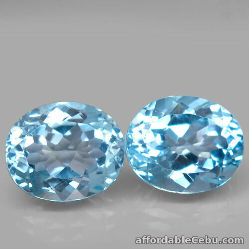 1st picture of 13.09 Carats IF Pair NATURAL Sky Blue TOPAZ for Jewelry Setting 12x10mm Oval For Sale in Cebu, Philippines