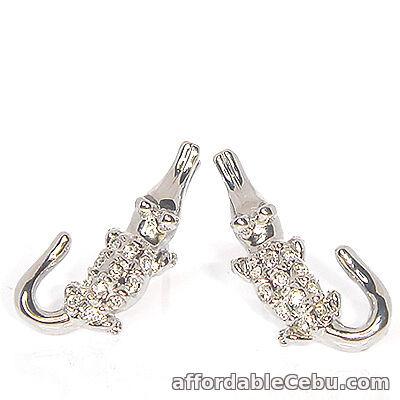 1st picture of Silver Colored Crocodile Stud Earrings For Sale in Cebu, Philippines