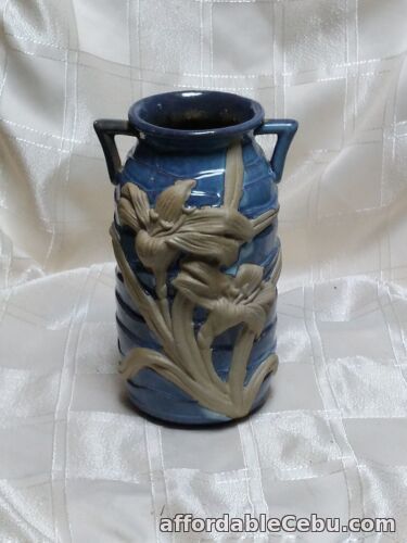 1st picture of Majolica vase Blue & White with raised lilies art nouveau pottery For Sale in Cebu, Philippines