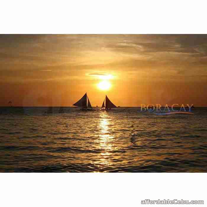 1st picture of Boracay package, with its ocean full of romantic paraws during sunset Offer in Cebu, Philippines