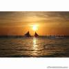 Boracay package, with its ocean full of romantic paraws during sunset