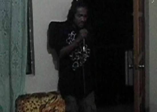 Picture of Homeless Man Jayson Palaboy sings Kahit Kailan