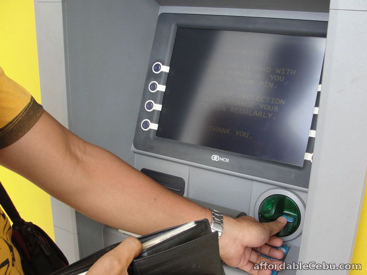 Insert ATM card to ATM Machine