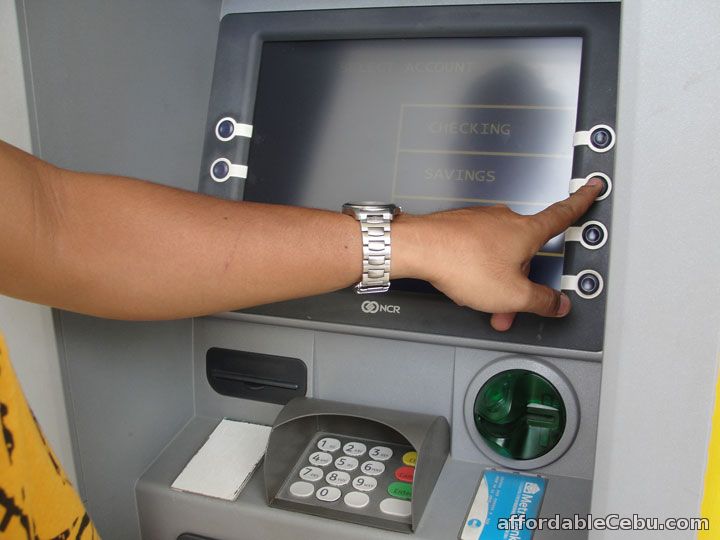 Withdraw money ATM machine-savings